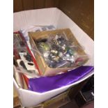 A box of knitting needles, buttons, new cross stitch sets etc