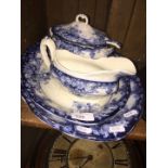 Blue & white porcelain to include 2 large platters, gravy boat, a tureen and a small plate.