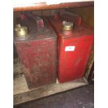 2 red painted jerry cans
