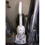 A Russell Hobbs Pet Cyclonic 1800 upright vacuum cleaner.