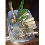 A tub of various silver plate comprising cutlery, spoons, a Norwegian cheese slice etc.