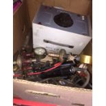 A box of assorted items, soldering irons, gas bottle regulators, variable voltage supply unit