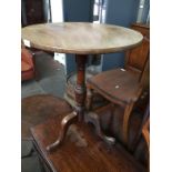 A George III mahogany tripod table.