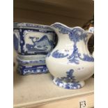 Blue and white planter on stand and jug