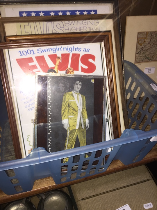 A box of Elvis pictures