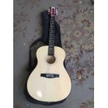 A CB SKY acoustic guitar