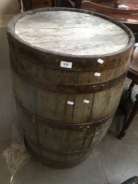 A metal bound oak barrel.