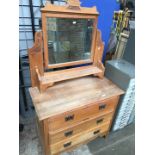 An Edwardian satin wood dressing chest.