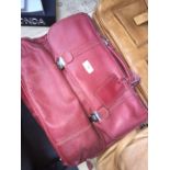 A Hideonline grab / travel bag in marsala / red leather - tag attached.