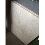 A pair of marble table tops 26.5 ins square