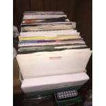 A box of vinyl singles/45s