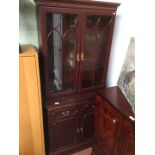 A mahogany effect bookcase.