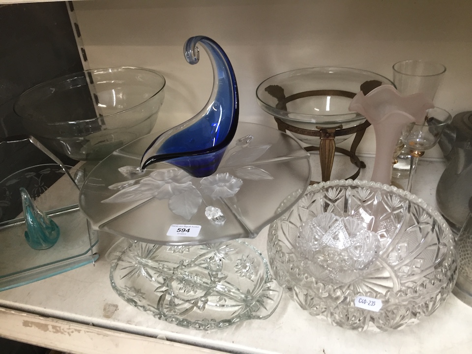 A large glass cake stand, cut glass bowl, centrepiece and other glassware