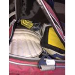 A bag containing cricket equipment