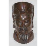 A Chinese carved wooden emperor's head, height 32cm.