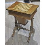 A Victorian parquetry inlaid walnut games and work table, height 76cm.