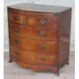 A miniature "apprentice" bow front mahogany chest of drawers in the Georgian style with brushing