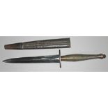 A WWII Fairbairn Sikes 2nd pattern FS fighting knife and leather scabbard.