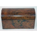 A Victorian burr walnut tea caddy of domed form, length 30cm.