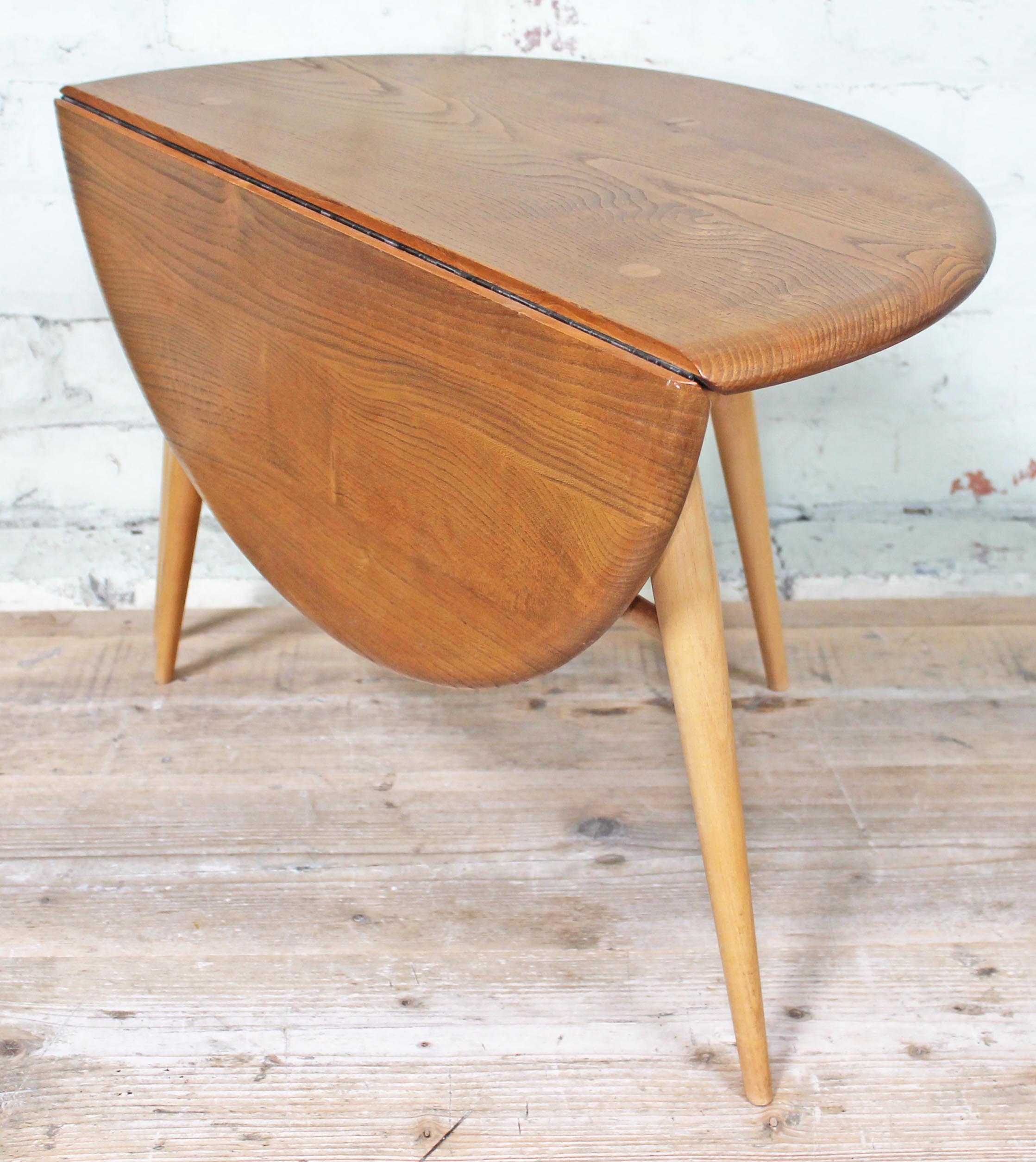 An Ercol blonde elm and beech occasional coffee table with drop leaf, length 61cm, min. depth 37cm & - Image 3 of 6