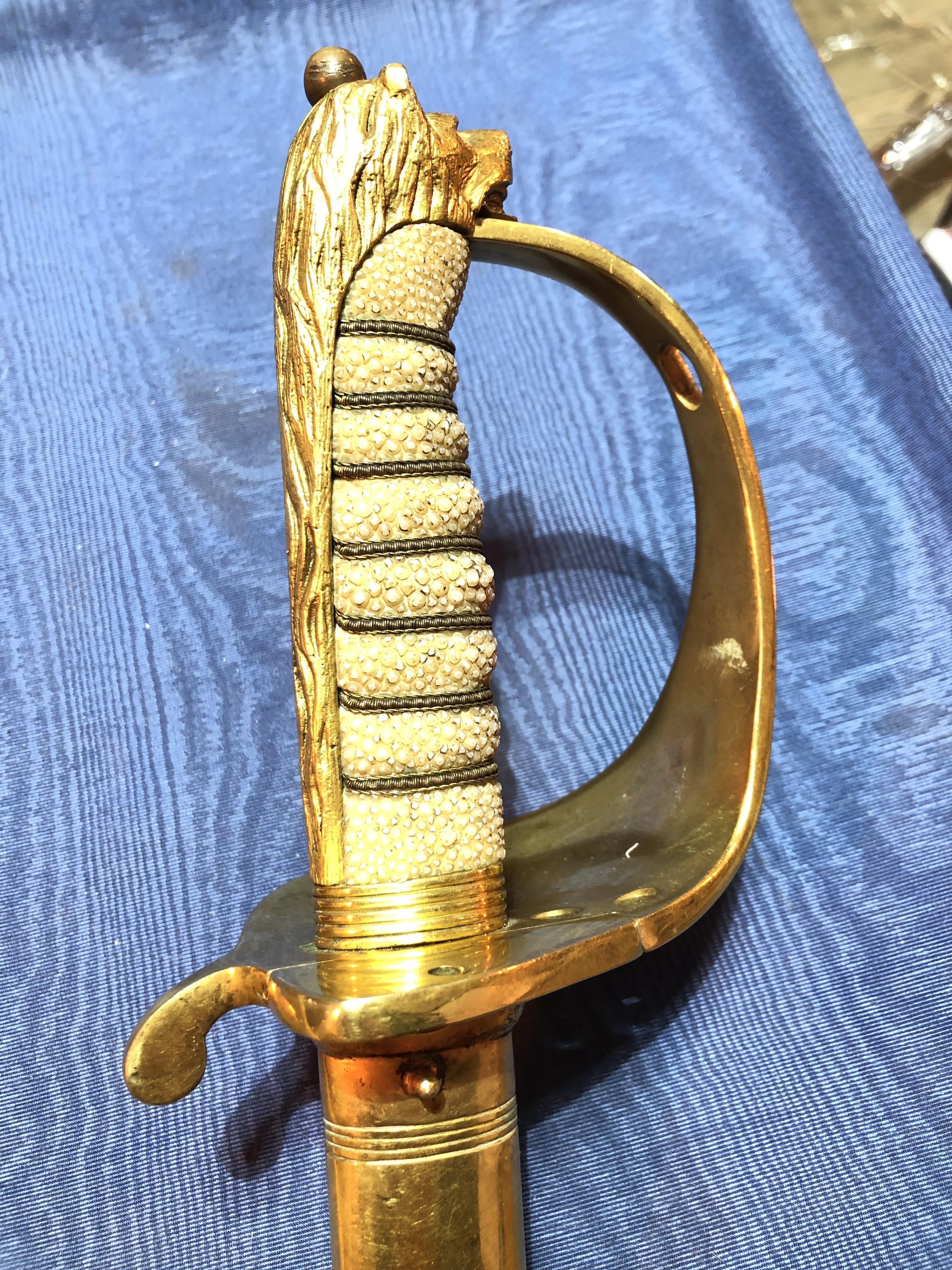 An Elizabeth II Navy officer's sword, the etched blade signed Gieves, with folding gilt brass hilt - Image 2 of 15