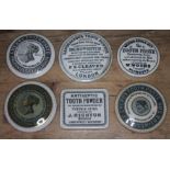 A group of six Victorian toothpaste pot lids.