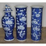 A group of three Chinese 19th century blue and white porcelain vases, each bearing Kangxi double