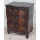 An early 20th century reproduction George II style serpentine chest of drawers of small