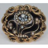 A 19th century yellow metal mourning brooch, having applied thistle and flower cameo within a