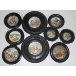 A group of nine Victorian prattware pot lids, various scenes.