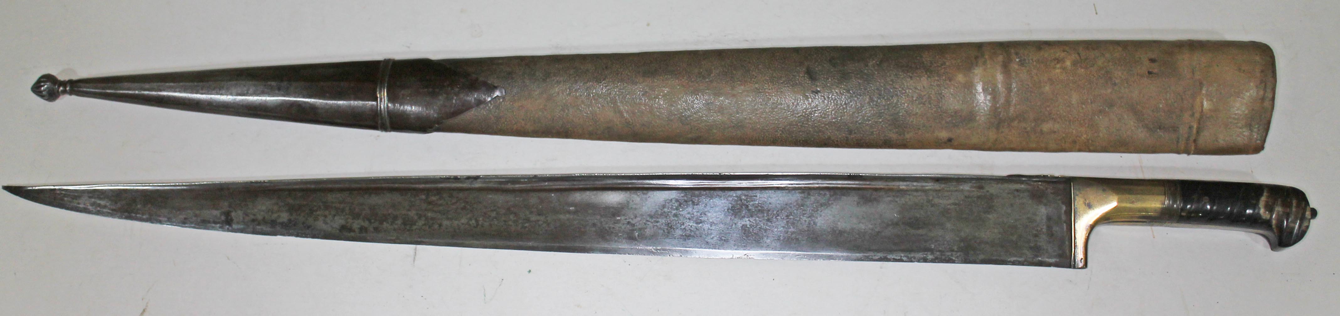 An Afghan khyber short sword and scabbard, length 87cm.