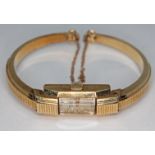 A Rotary 9ct gold bangle watch, gross wt. 18.5g.