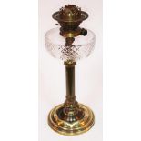 A Victorian Messenger brass oil lamp with cut glass reservoir, height 45cm.