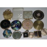 A quantity of vintage compacts.