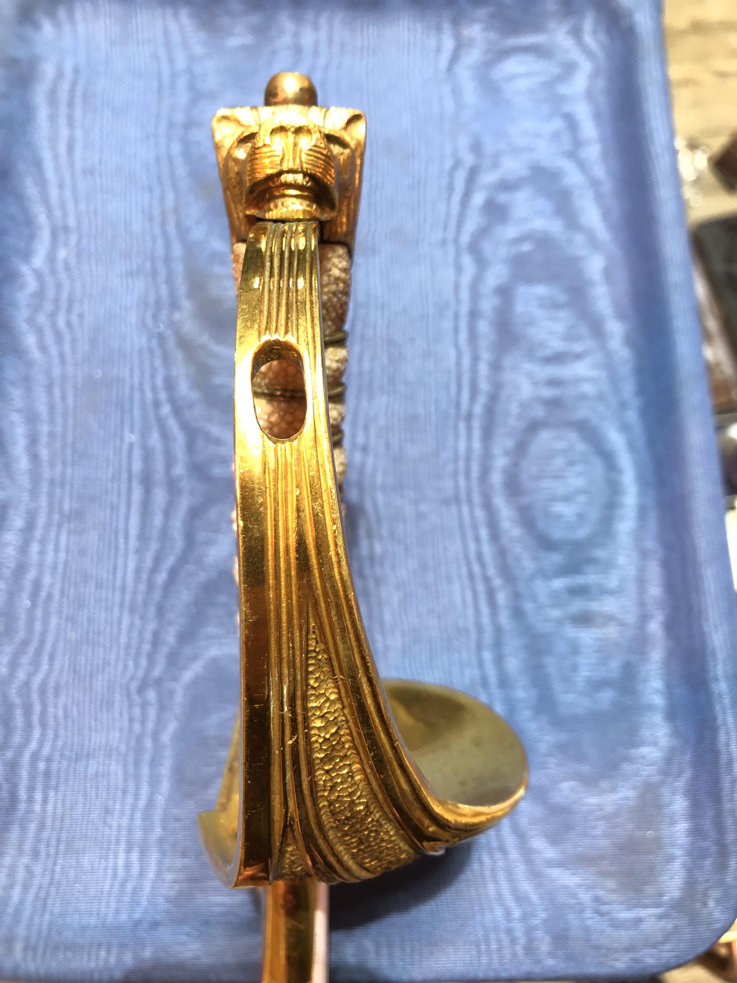 An Elizabeth II Navy officer's sword, the etched blade signed Gieves, with folding gilt brass hilt - Image 4 of 15