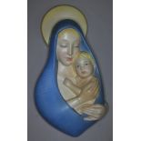 An Italian Lenci pottery wall plaque depicting the Madonna and child, length 31.5cm. Condition -