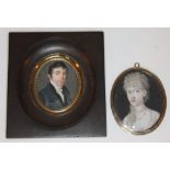 A matched pair of 19th century portrait miniatures, one framed 9.5cm x 10.5cm.