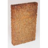 A Chinese Canton carved wood card case 7cm x 11cm.