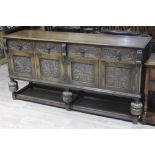 A carved oak sideboard, length 189cm, depth 51cm & height 95cm.