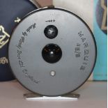 A Hardy Marquis #8/9 fly fishing reel with soft bag and box.