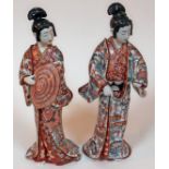 A pair of Japanese Kutani porcelain geisha figures, circa 1900, unmarked, height 45cm. Condition -