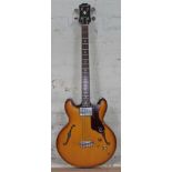 A 1960s Epiphone Rivoli hollow body four string bass guitar, style EBV232, serial number 163495.