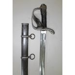 An Italian 1871 pattern heavy cavalry sword and scabbard, length 111cm.