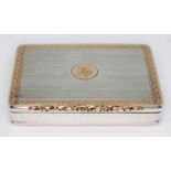 An early 19th century Austrian silver compact of rectangular waisted form, the top engraved and with