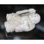 A Japanese carved ivory netsuke, Meiji period, length 5.4cm, unsigned.