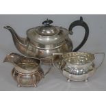 A three piece hallmarked silver tea set, gross wt. 30oz.