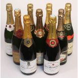 Nine bottles of Champagne, various labels.