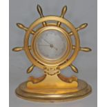 A gilt metal novelty barometer formed as a ship's wheel, Mansfield Dublin, height 19cm.