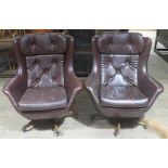 A pair of retro egg lounge chairs, swivel and reclining with teak base. Condition - one with repairs