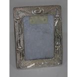 A hallmarked Art Nouveau silver photo frame, 19cm x 14cm.